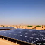 태양광 발전 설치 시 발생할 수 있는 유지보수 문제 - A detailed image of a solar panel cleaning scene in a dry, dusty environment typical of arid regions...